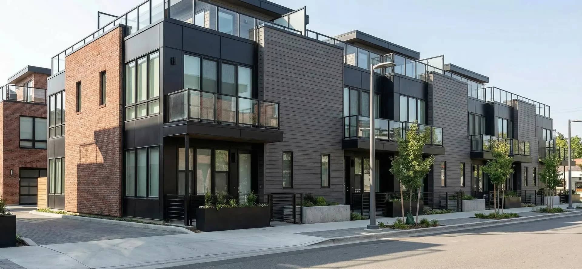 Townhome development with dark aluminum cladding
